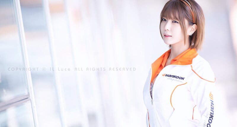 woman in white and orange jacket