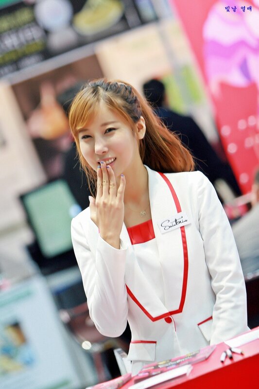 woman in white and red uniform