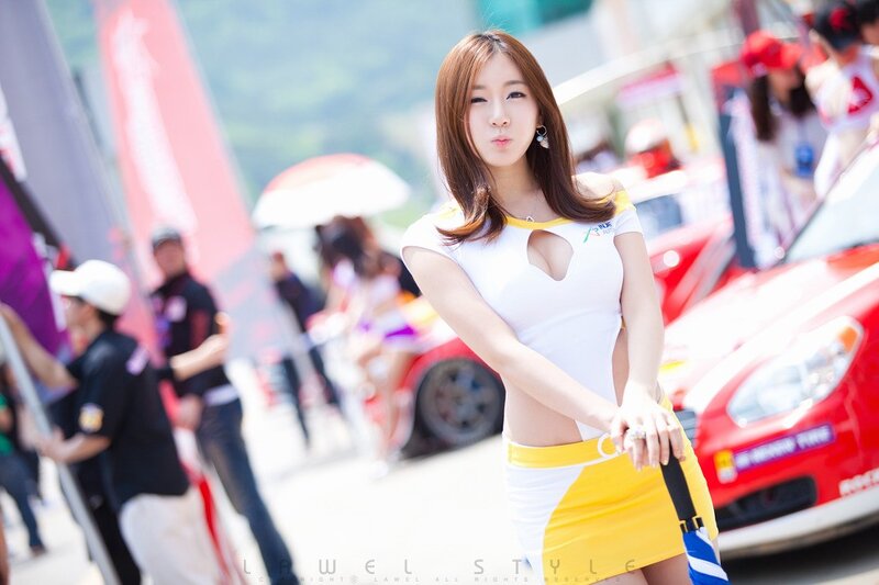 Woman in White and Yellow Outfit — Outdoor
