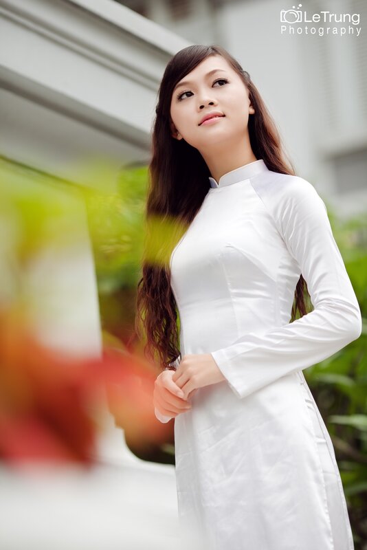 Woman in white ao dai