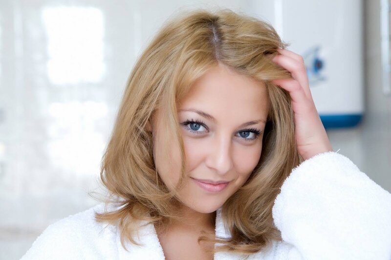 woman in white bathrobe