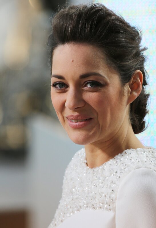 woman in white beaded dress