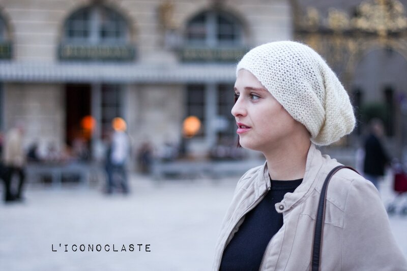 woman in white beanie