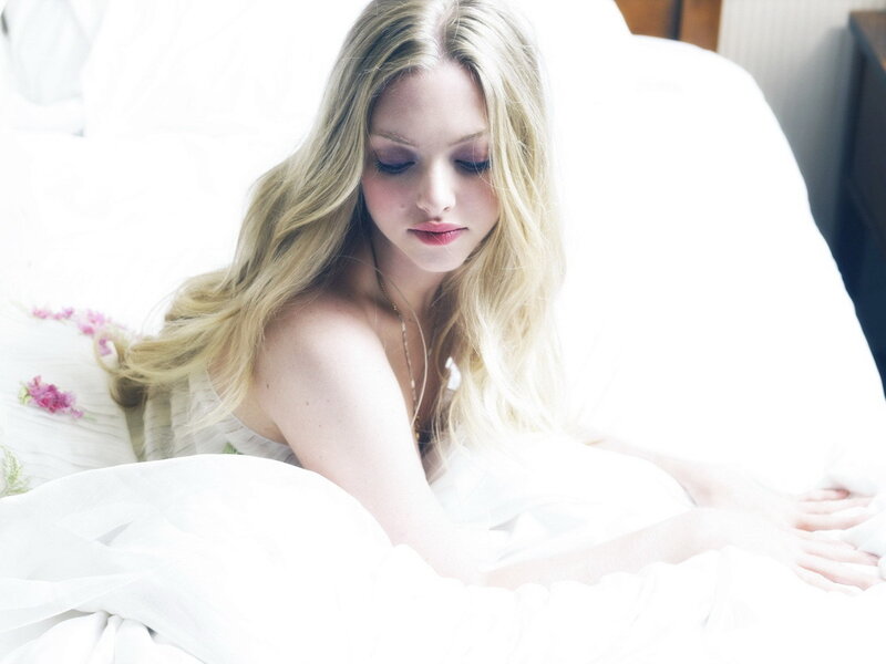 woman in white bed