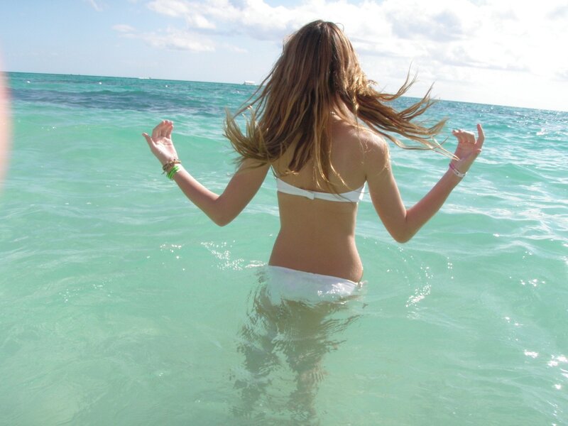 woman in white bikini at beach