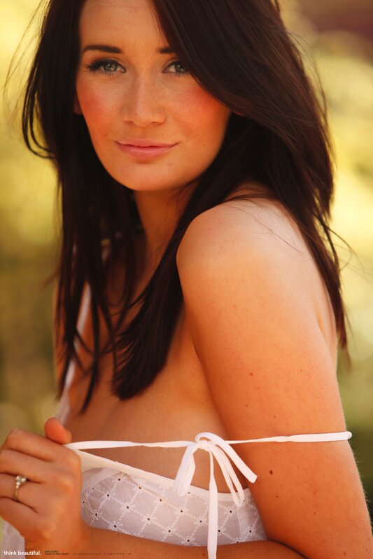 woman in white bikini top