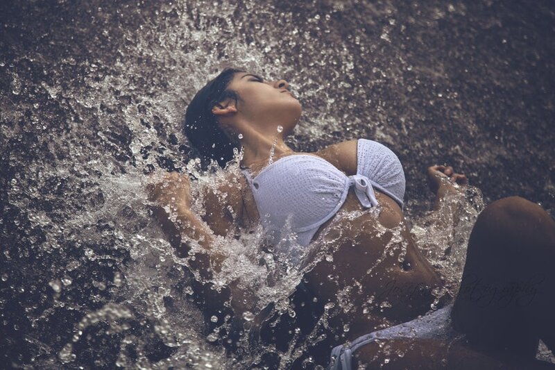 woman in white bikini under water