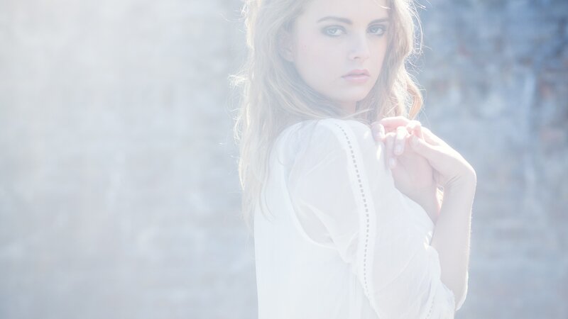 woman in white blouse