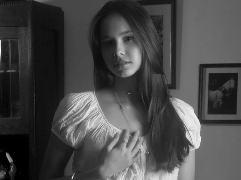 Woman in White Blouse — Black, Serious