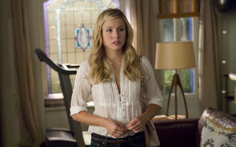 woman in white blouse indoors