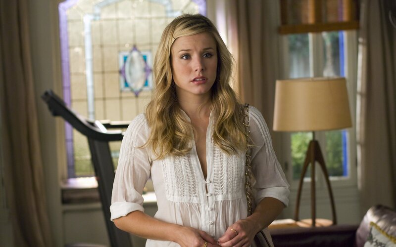 woman in white blouse indoors