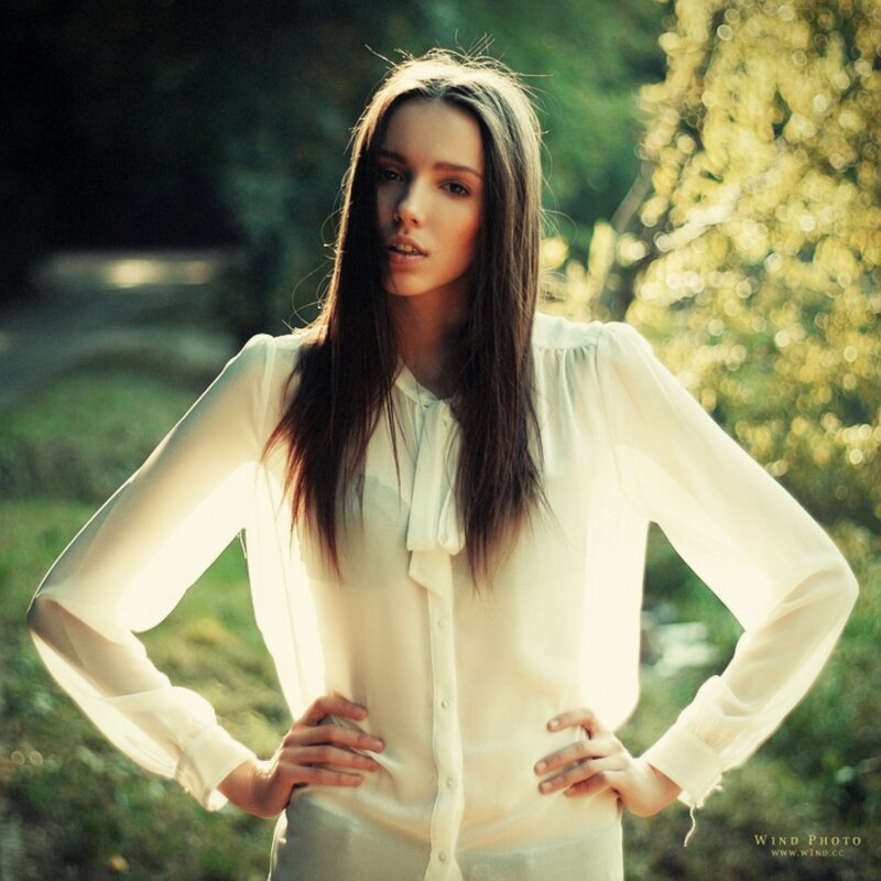 woman in white blouse outdoors