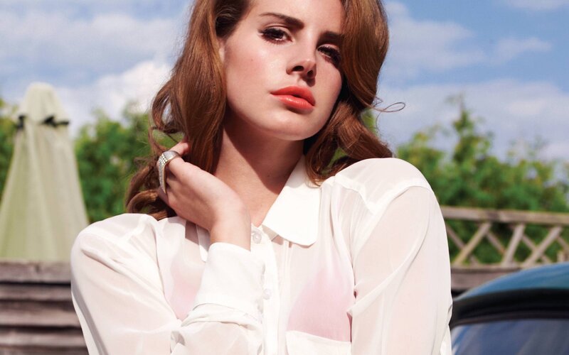 woman in white blouse outdoors