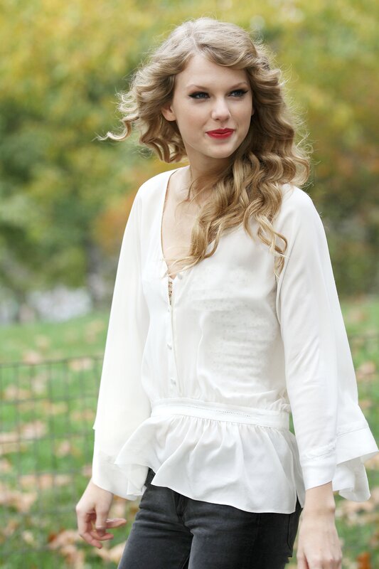 woman in white blouse outdoors