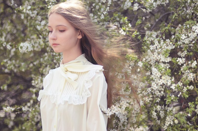 Woman in White Blouse — Serene, Spring