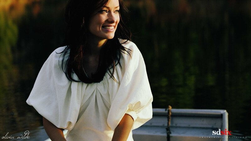 Woman in White Blouse — Serene, Sunset, Photograph, Boat