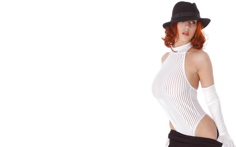 woman in white bodysuit and hat
