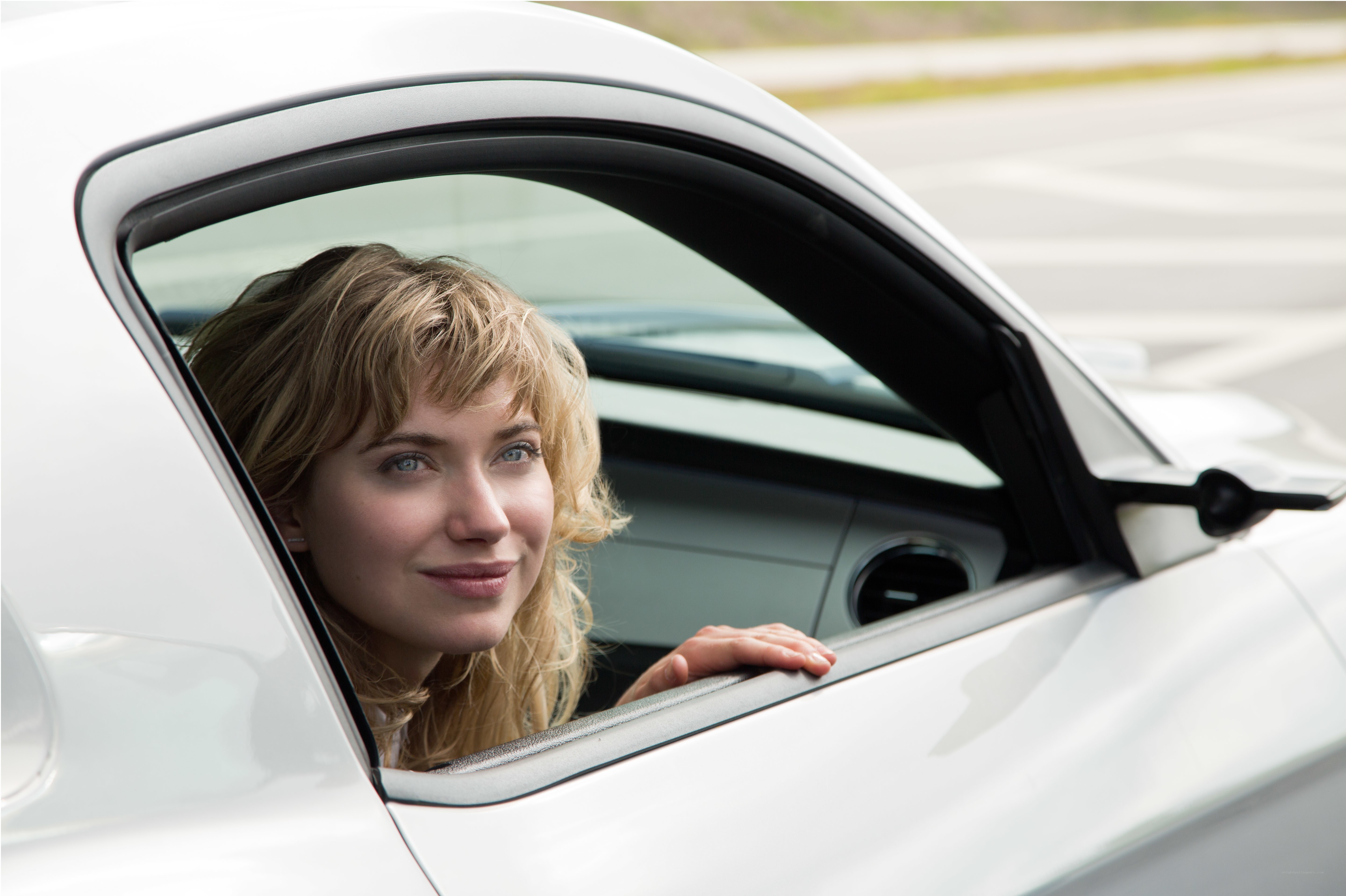 woman in white car