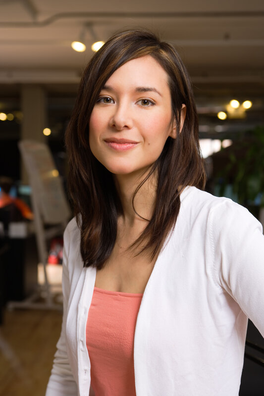 woman in white cardigan