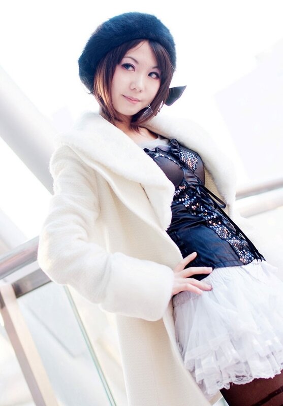 woman in white coat and hat
