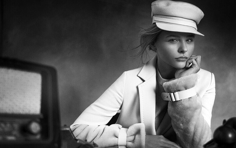 Woman in White Coat — Black, Dramatic, Photograph