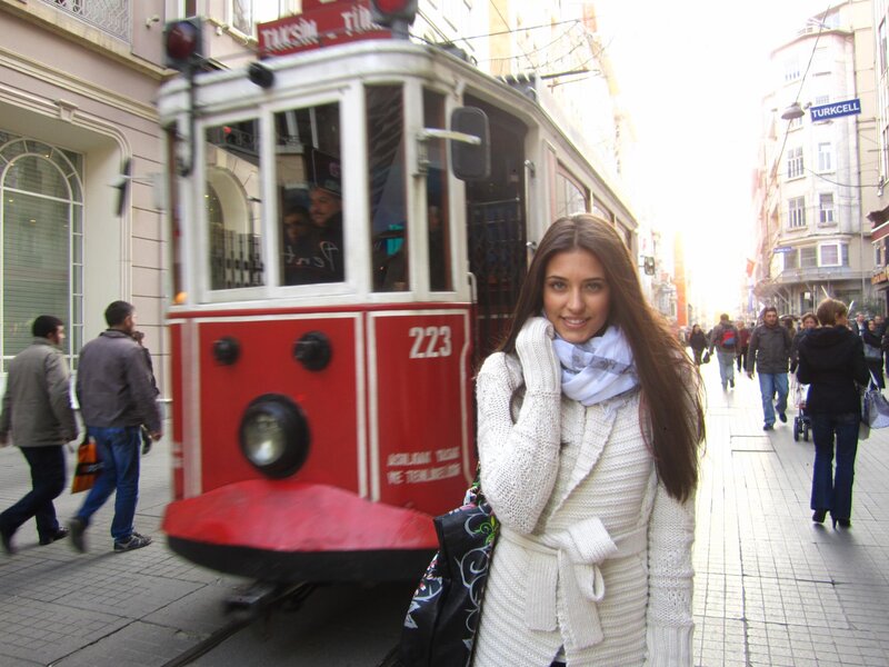 Woman in White Coat — Busy