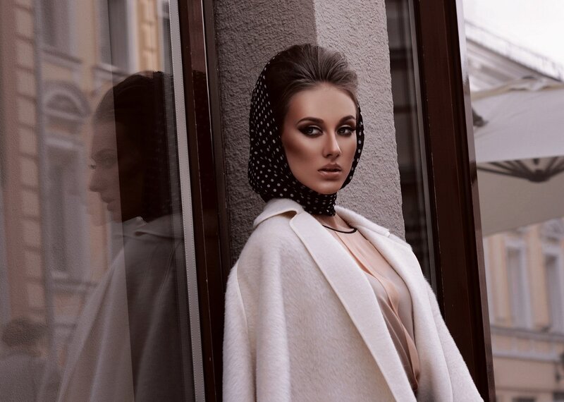 Woman in White Coat — Dramatic, Afternoon, Photograph, Scarf