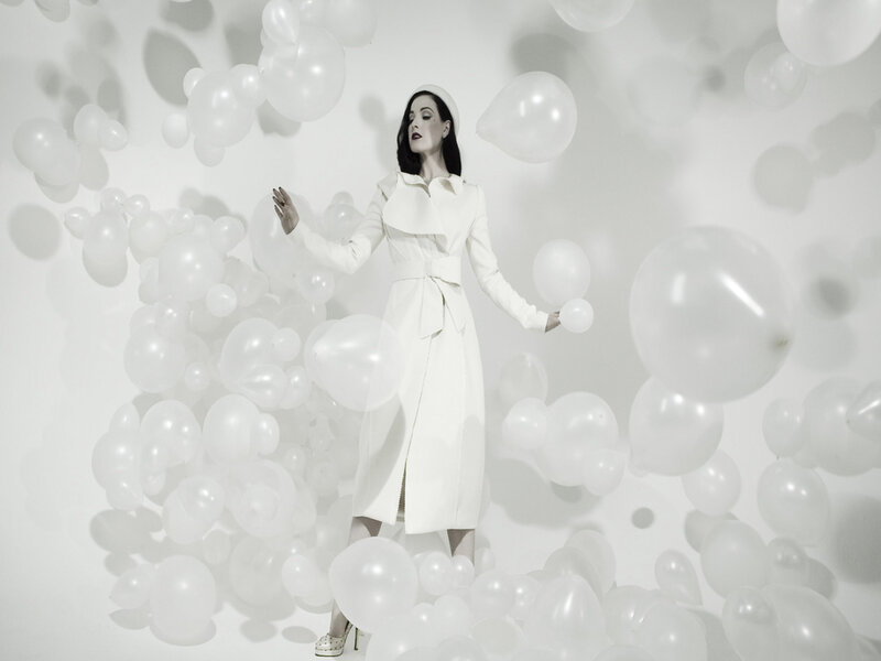 Woman in White Coat — Dramatic, Photograph