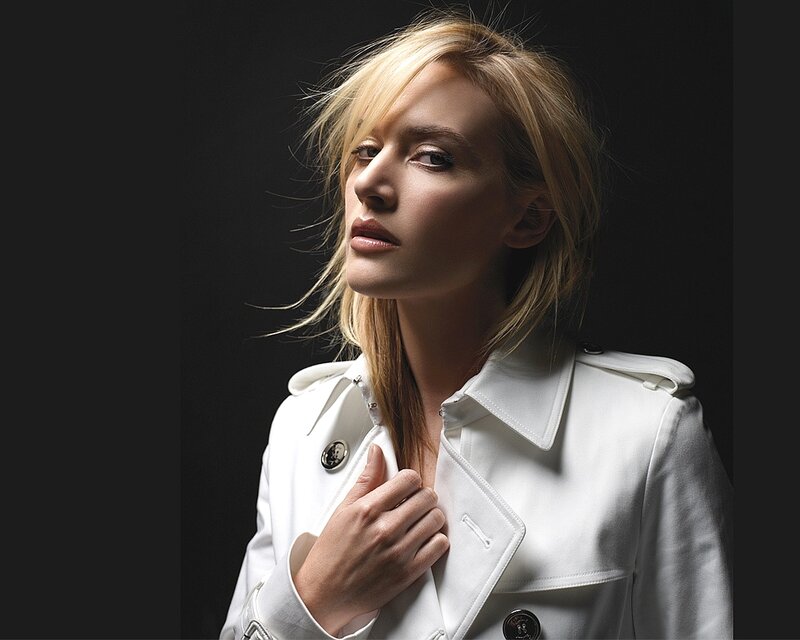 Woman in White Coat — Dramatic