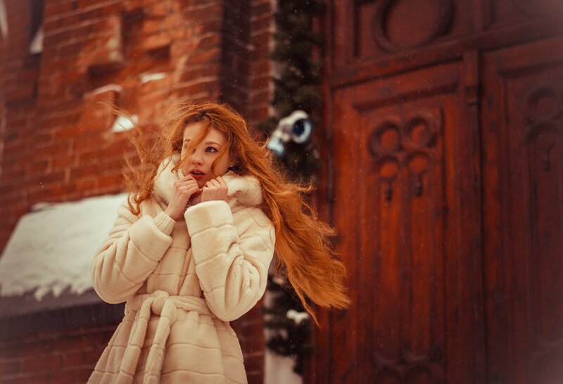 Woman in White Coat — Dramatic, Winter, Photograph