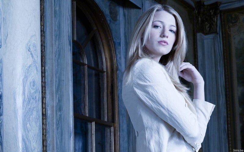 woman in white coat indoors