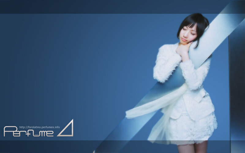 woman in white coat on blue background
