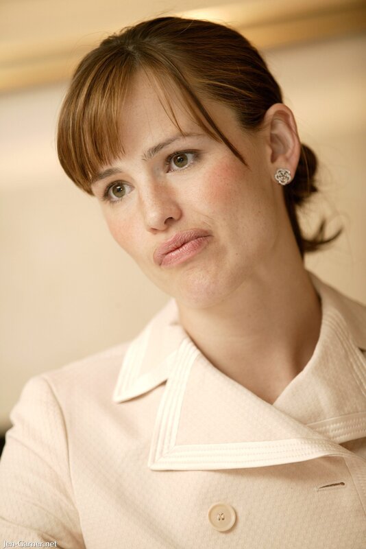 woman in white coat with pout