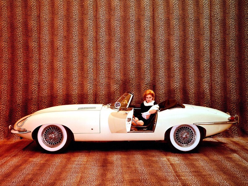 Woman in white convertible car