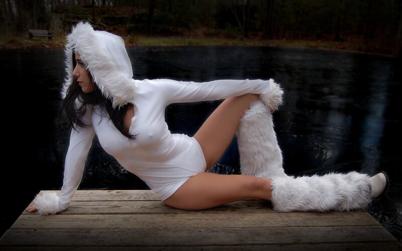 Woman in white costume on dock