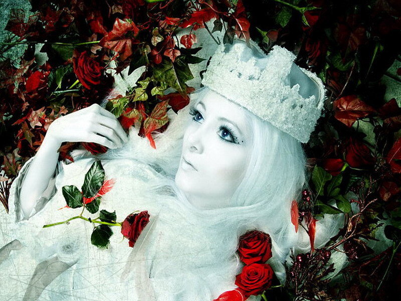 woman in white crown among red roses