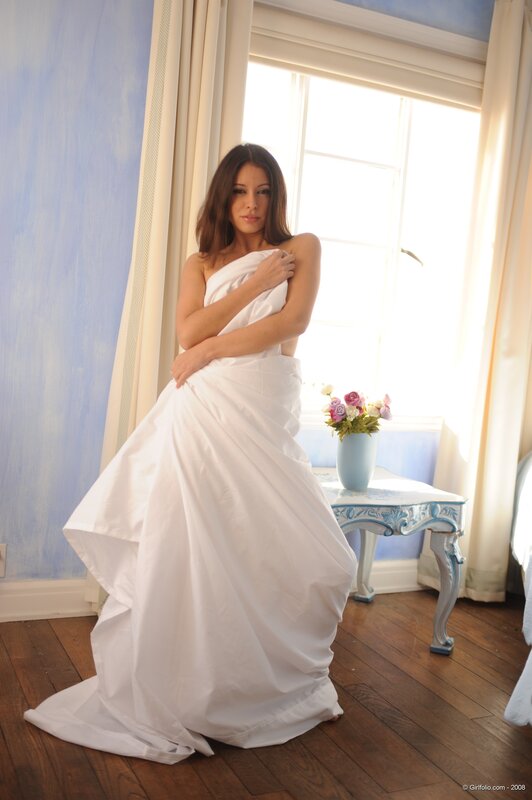 woman in white draped dress