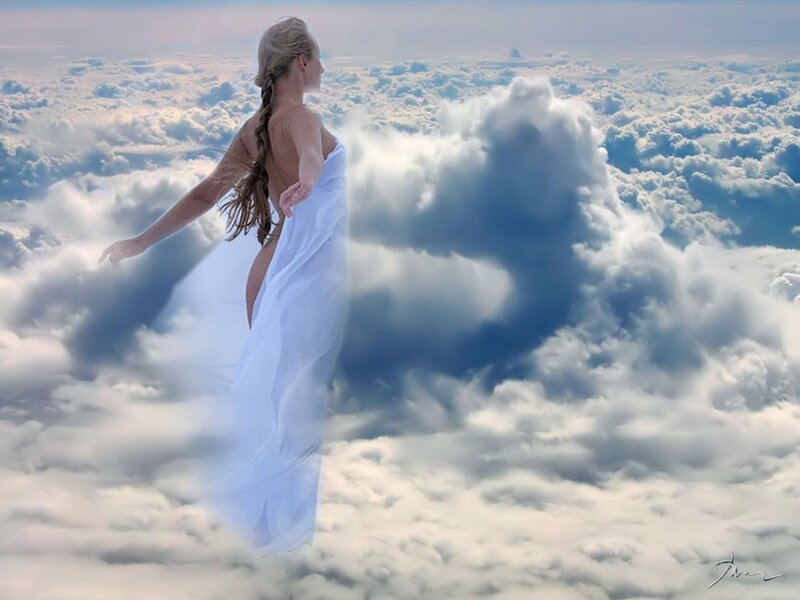woman in white dress among clouds