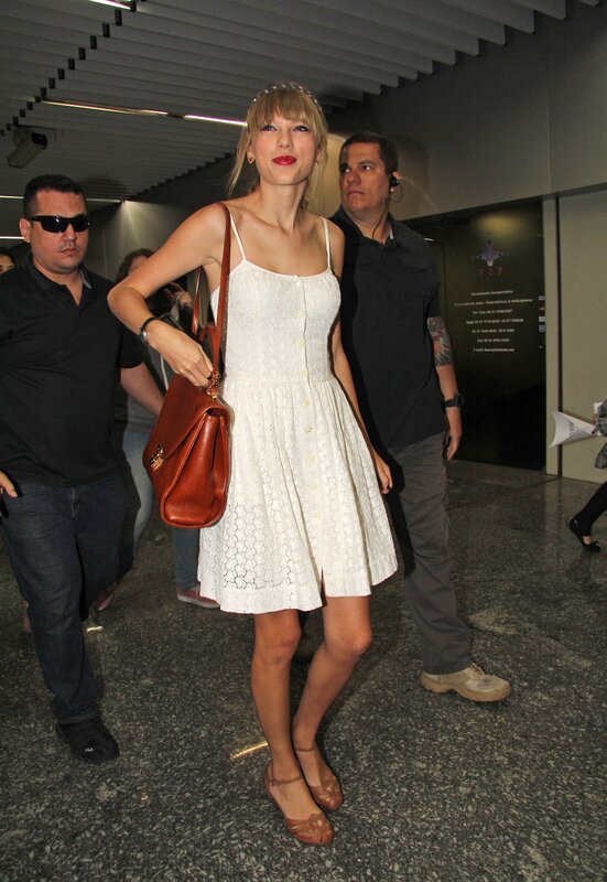 woman in white dress at airport