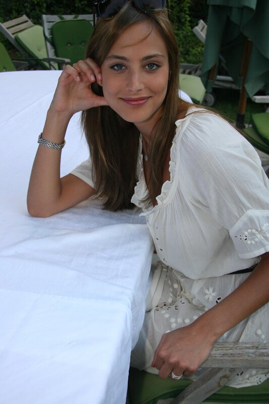 woman in white dress at outdoor table