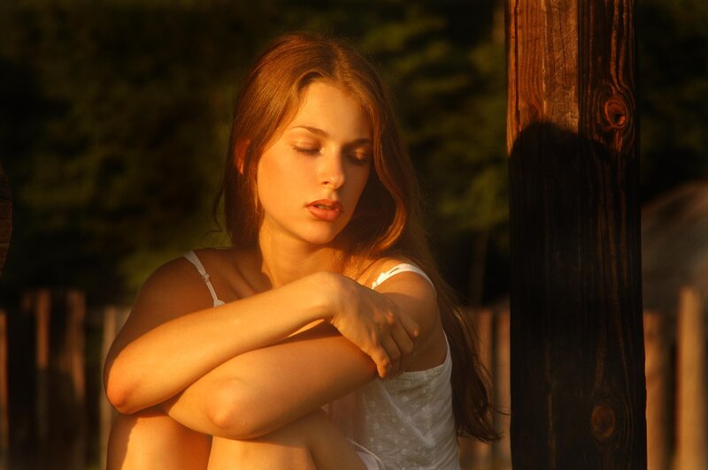 woman in white dress at sunset