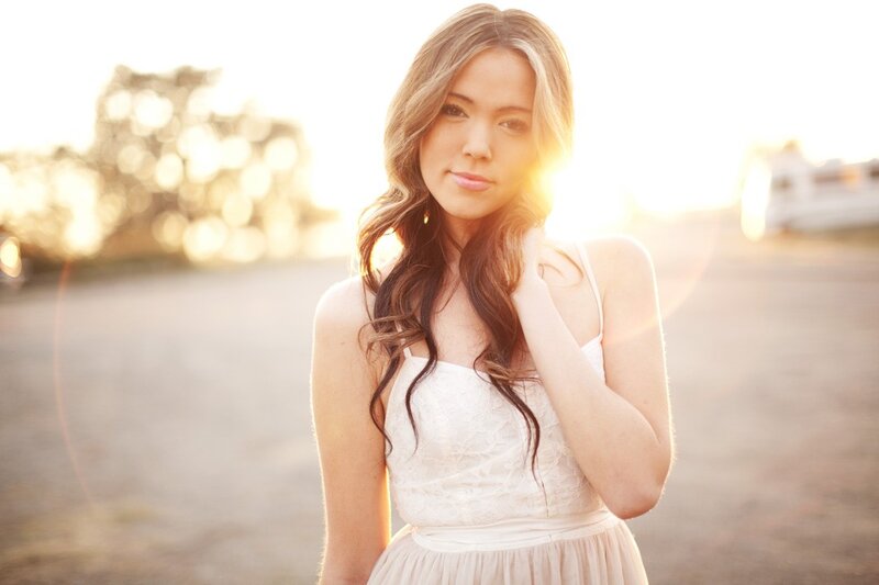 woman in white dress at sunset