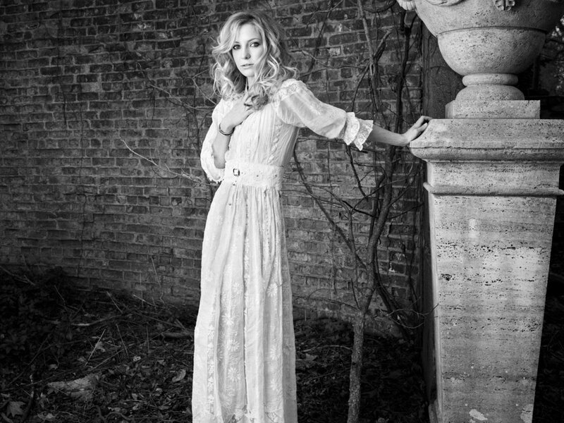 Woman in White Dress — Black, Dramatic, Photograph, Brick Wall