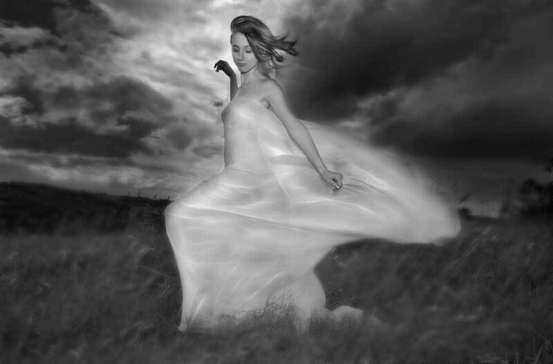 Woman in White Dress — Black, Dramatic, Photograph, Field, Clouds