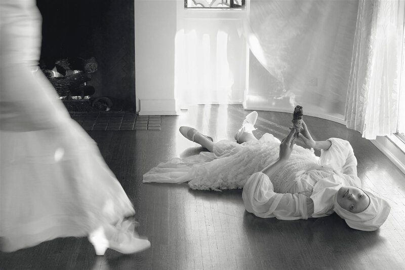 Woman in White Dress — Black, Dramatic, Photograph, Fireplace, Floor
