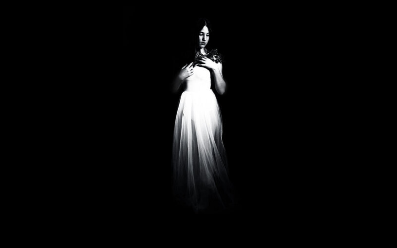 Woman in White Dress — Black, Dramatic, Photograph, Flowers
