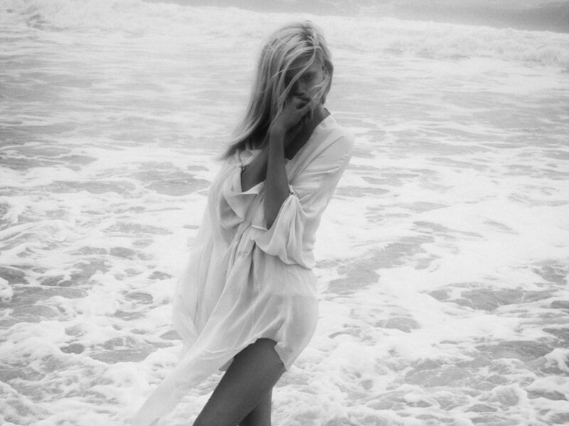 Woman in White Dress — Black, Serene, Photograph, Beach