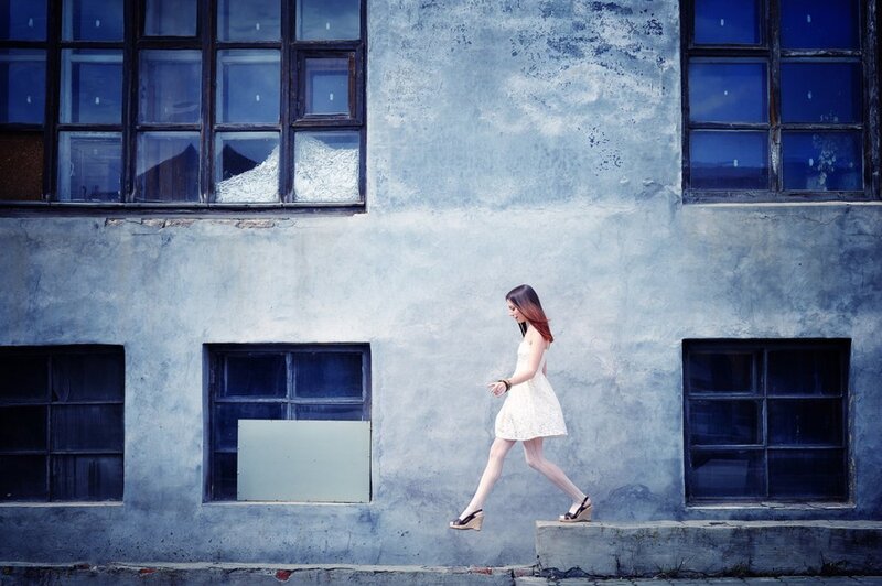 Woman in White Dress — Blue, Dramatic, Photograph, Building