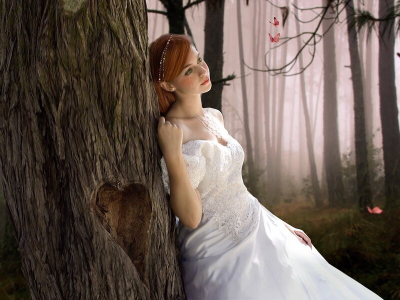 woman in white dress by tree