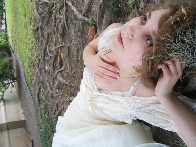 woman in white dress by tree